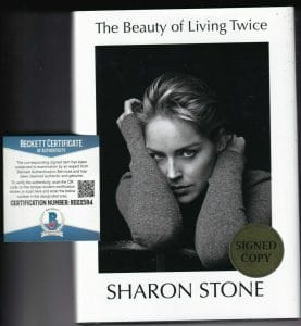 SHARON STONE SIGNED (THE BEAUTY OF LIVING TWICE) HARDCOVER BOOK BECKETT BAS COLLECTIBLE MEMORABILIA