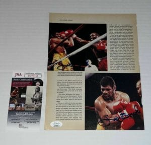 LEON SPINKS SIGNED BOXING MAGAZINE PAGE HEAVYWEIGHT CHAMP AUTOGRAPHED 4 JSA COLLECTIBLE MEMORABILIA