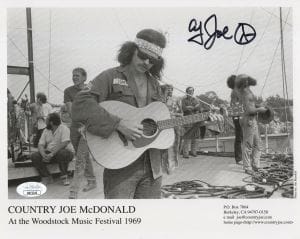 COUNTRY JOE MCDONALD HAND SIGNED 8×10 PHOTO 1969 WOODSTOCK POSE JSA
 COLLECTIBLE MEMORABILIA