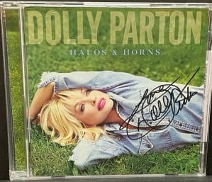 DOLLY PARTON SIGNED AUTOGRAPH CD “HALOS AND HORNS” COVER INSERT COUNTRY JSA COLLECTIBLE MEMORABILIA