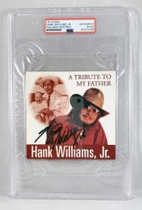 COUNTRY SINGER HANK WILLIAMS JR SIGNED CD COVER PSA/DNA 9 COA COLLECTIBLE MEMORABILIA