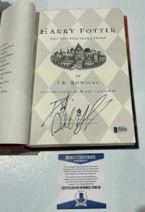DANIEL RADCLIFFE SIGNED HARRY POTTER AND THE SORCERER’S STONE BOOK BECKETT 109 COLLECTIBLE MEMORABILIA