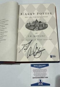 DANIEL RADCLIFFE SIGNED HARRY POTTER AND THE SORCERER’S STONE BOOK BECKETT 129 COLLECTIBLE MEMORABILIA