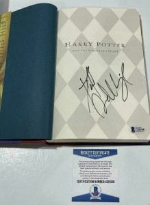 DANIEL RADCLIFFE SIGNED HARRY POTTER AND THE SORCERER’S STONE BOOK BECKETT 140 COLLECTIBLE MEMORABILIA