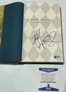 DANIEL RADCLIFFE SIGNED HARRY POTTER AND THE SORCERER’S STONE BOOK BECKETT 159 COLLECTIBLE MEMORABILIA