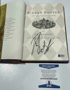 DANIEL RADCLIFFE SIGNED HARRY POTTER AND THE SORCERER’S STONE BOOK BECKETT 150 COLLECTIBLE MEMORABILIA