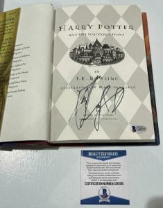 DANIEL RADCLIFFE SIGNED HARRY POTTER AND THE SORCERER’S STONE BOOK BECKETT 163 COLLECTIBLE MEMORABILIA