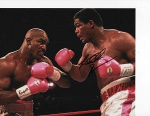 BOXER RIDDICK BOWE PINK GLOVES SIGNED 8X10 COLLECTIBLE MEMORABILIA