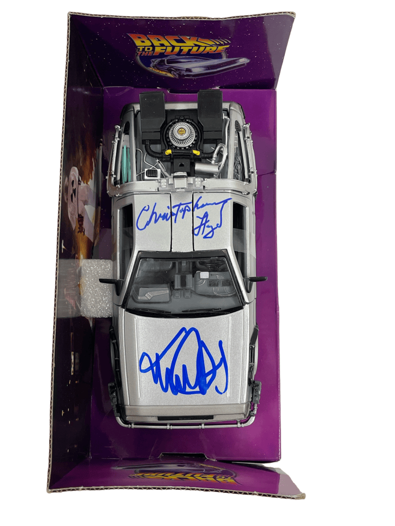 MICHAEL J FOX CHRISTOPHER LLOYD SIGNED BACK TO THE FUTURE 1:24 DELOREAN PSA 12 COLLECTIBLE MEMORABILIA