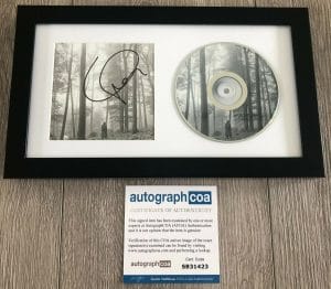 TAYLOR SWIFT SIGNED AUTOGRAPH FOLKLORE FRAMED & MATTED CD W/ ACOA
 COLLECTIBLE MEMORABILIA